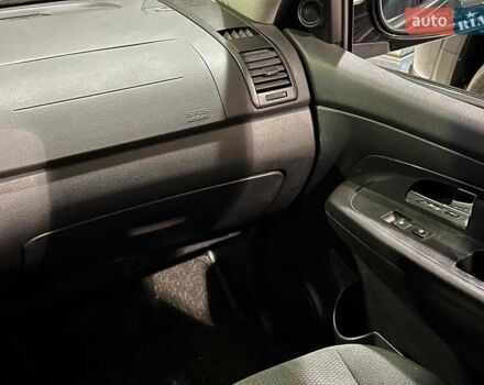 Черный Cанг Йонг Рекстон, объемом двигателя 2.7 л и пробегом 63 тыс. км за 11440 $, фото 16 на Automoto.ua