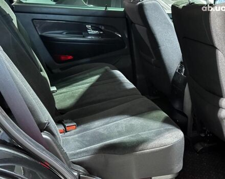 Черный Cанг Йонг Рекстон, объемом двигателя 2.7 л и пробегом 63 тыс. км за 11440 $, фото 13 на Automoto.ua