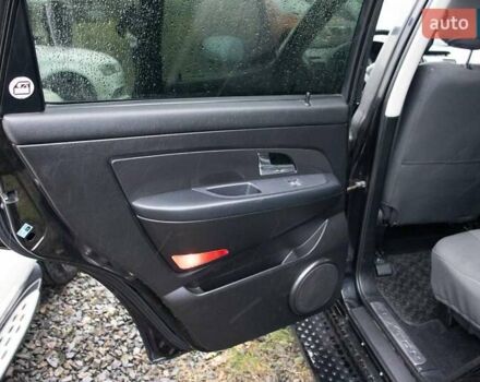 Чорний Cанг Йонг Rexton, об'ємом двигуна 2.7 л та пробігом 123 тис. км за 9000 $, фото 11 на Automoto.ua