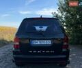 Черный Cанг Йонг Рекстон, объемом двигателя 2.7 л и пробегом 187 тыс. км за 8200 $, фото 5 на Automoto.ua
