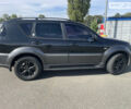 Чорний Cанг Йонг Rexton, об'ємом двигуна 2 л та пробігом 179 тис. км за 9999 $, фото 4 на Automoto.ua