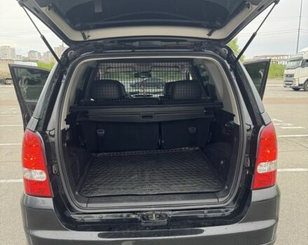 Черный Cанг Йонг Рекстон, объемом двигателя 2.7 л и пробегом 247 тыс. км за 10000 $, фото 15 на Automoto.ua