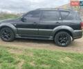 Чорний Cанг Йонг Rexton, об'ємом двигуна 2 л та пробігом 179 тис. км за 9999 $, фото 3 на Automoto.ua