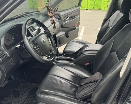 Черный Cанг Йонг Рекстон, объемом двигателя 2.7 л и пробегом 247 тыс. км за 10000 $, фото 16 на Automoto.ua