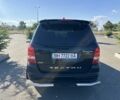 Черный Cанг Йонг Рекстон, объемом двигателя 2.7 л и пробегом 221 тыс. км за 10800 $, фото 1 на Automoto.ua