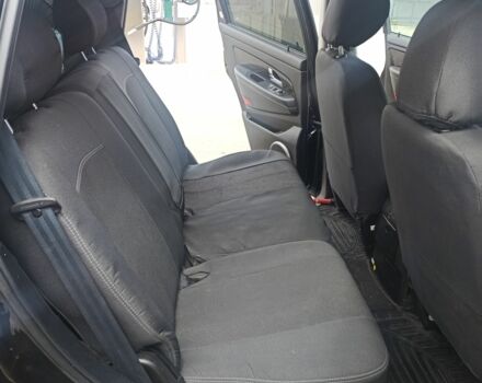 Черный Cанг Йонг Рекстон, объемом двигателя 2.7 л и пробегом 95 тыс. км за 17000 $, фото 3 на Automoto.ua