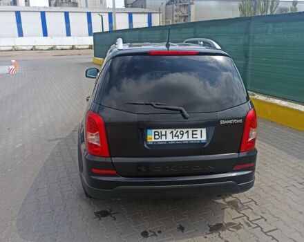 Черный Cанг Йонг Рекстон, объемом двигателя 2.7 л и пробегом 95 тыс. км за 17000 $, фото 4 на Automoto.ua