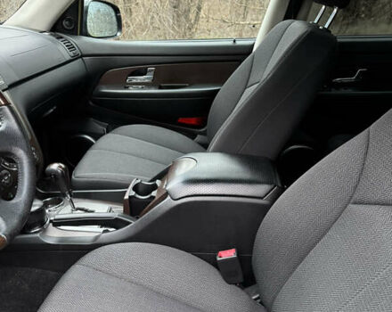 Чорний Cанг Йонг Rexton, об'ємом двигуна 2.7 л та пробігом 82 тис. км за 10900 $, фото 3 на Automoto.ua