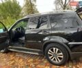 Черный Cанг Йонг Рекстон, объемом двигателя 2.7 л и пробегом 149 тыс. км за 12000 $, фото 1 на Automoto.ua