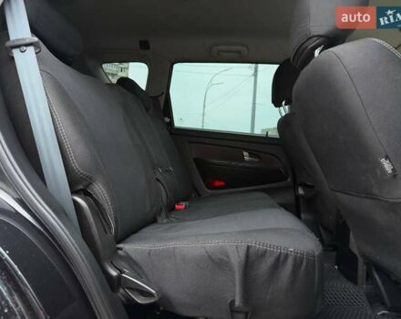 Чорний Cанг Йонг Rexton, об'ємом двигуна 2 л та пробігом 155 тис. км за 13890 $, фото 10 на Automoto.ua