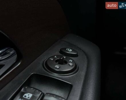 Чорний Cанг Йонг Rexton, об'ємом двигуна 2 л та пробігом 155 тис. км за 13890 $, фото 16 на Automoto.ua
