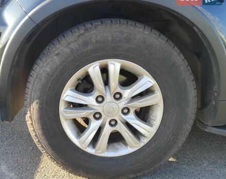 Черный Cанг Йонг Рекстон, объемом двигателя 2 л и пробегом 158 тыс. км за 13800 $, фото 1 на Automoto.ua