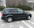 Чорний Cанг Йонг Rexton, об'ємом двигуна 2 л та пробігом 150 тис. км за 11700 $, фото 11 на Automoto.ua