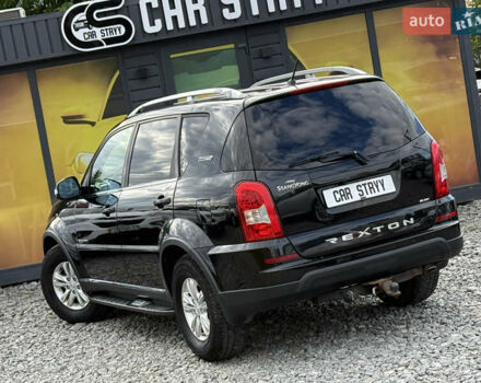 Чорний Cанг Йонг Rexton, об'ємом двигуна 2 л та пробігом 253 тис. км за 13900 $, фото 16 на Automoto.ua