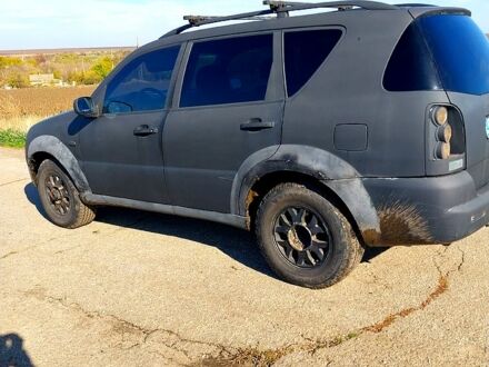 Черный Cанг Йонг Рекстон, объемом двигателя 2.7 л и пробегом 230 тыс. км за 2600 $, фото 1 на Automoto.ua