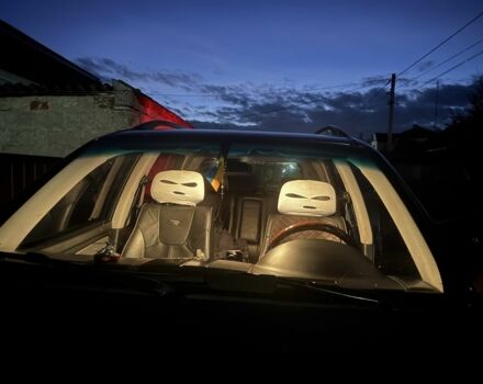 Черный Cанг Йонг Рекстон, объемом двигателя 2.7 л и пробегом 352 тыс. км за 8000 $, фото 1 на Automoto.ua