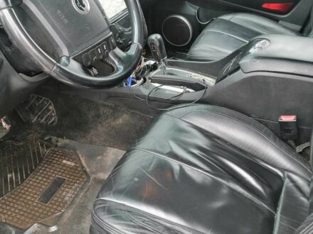 Черный Cанг Йонг Рекстон, объемом двигателя 2.7 л и пробегом 397 тыс. км за 42000 $, фото 1 на Automoto.ua