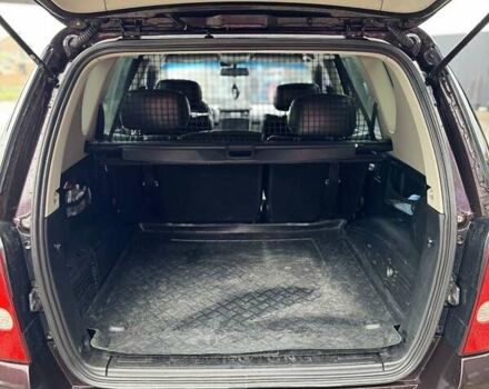 Фиолетовый Cанг Йонг Рекстон, объемом двигателя 2.7 л и пробегом 264 тыс. км за 8500 $, фото 15 на Automoto.ua