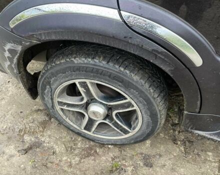 Коричневый Cанг Йонг Рекстон, объемом двигателя 2.7 л и пробегом 268 тыс. км за 3200 $, фото 4 на Automoto.ua