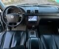 Сірий Cанг Йонг Rexton, об'ємом двигуна 2.7 л та пробігом 100 тис. км за 2001 $, фото 6 на Automoto.ua