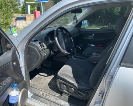 Серый Cанг Йонг Рекстон, объемом двигателя 2.7 л и пробегом 235 тыс. км за 4500 $, фото 2 на Automoto.ua