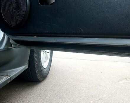 Сірий Cанг Йонг Rexton, об'ємом двигуна 2.7 л та пробігом 168 тис. км за 9350 $, фото 7 на Automoto.ua