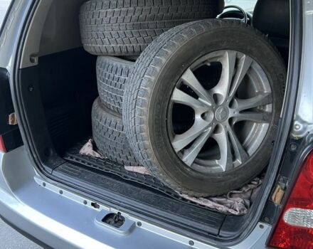 Сірий Cанг Йонг Rexton, об'ємом двигуна 2.7 л та пробігом 110 тис. км за 9000 $, фото 13 на Automoto.ua