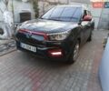 Чорний Cанг Йонг Тіволі, об'ємом двигуна 1.6 л та пробігом 105 тис. км за 12650 $, фото 1 на Automoto.ua