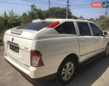 Белый Cанг Йонг Korando Sports, объемом двигателя 2 л и пробегом 194 тыс. км за 15077 $, фото 4 на Automoto.ua