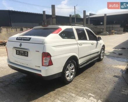 Белый Cанг Йонг Korando Sports, объемом двигателя 2 л и пробегом 194 тыс. км за 15077 $, фото 13 на Automoto.ua