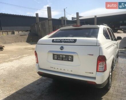 Белый Cанг Йонг Korando Sports, объемом двигателя 2 л и пробегом 194 тыс. км за 15077 $, фото 7 на Automoto.ua