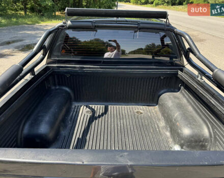 Черный Cанг Йонг Korando Sports, объемом двигателя 2 л и пробегом 265 тыс. км за 15500 $, фото 10 на Automoto.ua