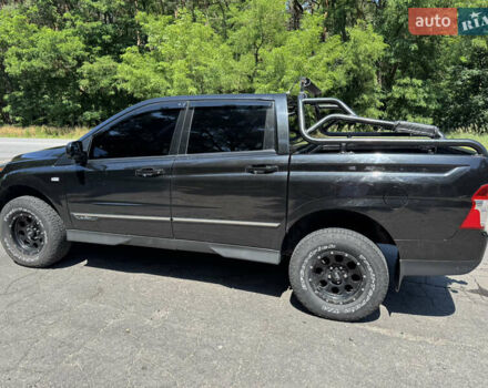 Черный Cанг Йонг Korando Sports, объемом двигателя 2 л и пробегом 265 тыс. км за 15500 $, фото 11 на Automoto.ua