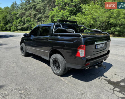 Черный Cанг Йонг Korando Sports, объемом двигателя 2 л и пробегом 265 тыс. км за 15500 $, фото 12 на Automoto.ua