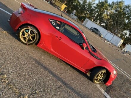 Красный Субару БРЗ, объемом двигателя 2 л и пробегом 172 тыс. км за 11900 $, фото 1 на Automoto.ua