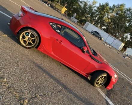 Красный Субару БРЗ, объемом двигателя 2 л и пробегом 172 тыс. км за 11900 $, фото 1 на Automoto.ua