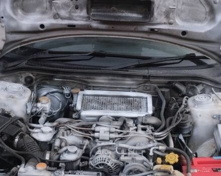 Белый Субару Форестер, объемом двигателя 2 л и пробегом 250 тыс. км за 4003 $, фото 1 на Automoto.ua