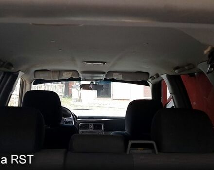 Белый Субару Форестер, объемом двигателя 2 л и пробегом 214 тыс. км за 5250 $, фото 10 на Automoto.ua