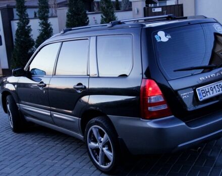 Черный Субару Форестер, объемом двигателя 2.5 л и пробегом 250 тыс. км за 5852 $, фото 3 на Automoto.ua