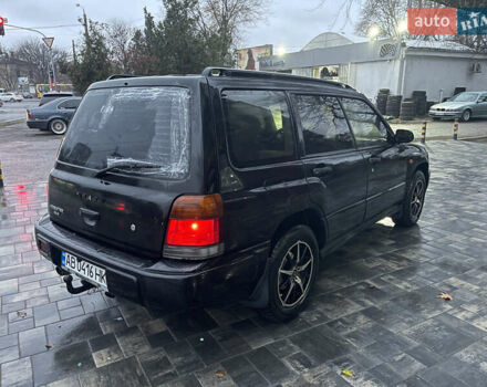 Черный Субару Форестер, объемом двигателя 1.99 л и пробегом 360 тыс. км за 2950 $, фото 4 на Automoto.ua