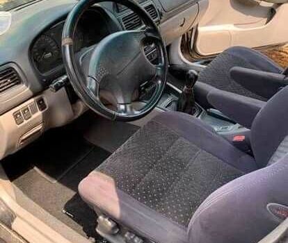 Черный Субару Форестер, объемом двигателя 2 л и пробегом 227 тыс. км за 3200 $, фото 2 на Automoto.ua