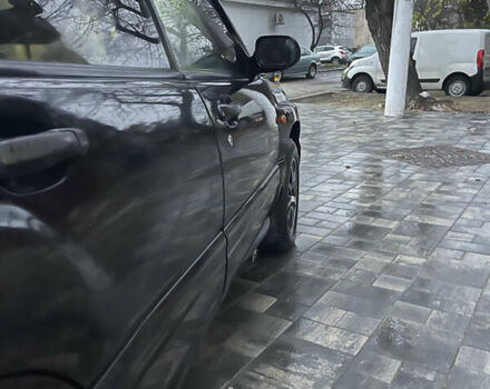 Черный Субару Форестер, объемом двигателя 1.99 л и пробегом 360 тыс. км за 2950 $, фото 7 на Automoto.ua