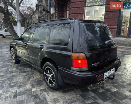 Черный Субару Форестер, объемом двигателя 1.99 л и пробегом 360 тыс. км за 2950 $, фото 2 на Automoto.ua