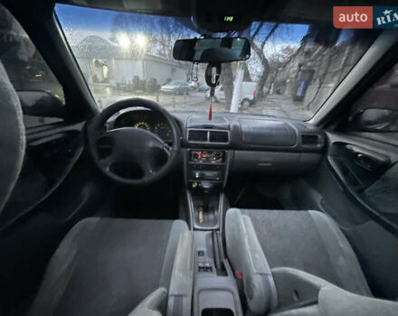 Черный Субару Форестер, объемом двигателя 1.99 л и пробегом 360 тыс. км за 2950 $, фото 13 на Automoto.ua