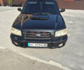 Чорний Субару Forester, об'ємом двигуна 2 л та пробігом 230 тис. км за 6000 $, фото 1 на Automoto.ua