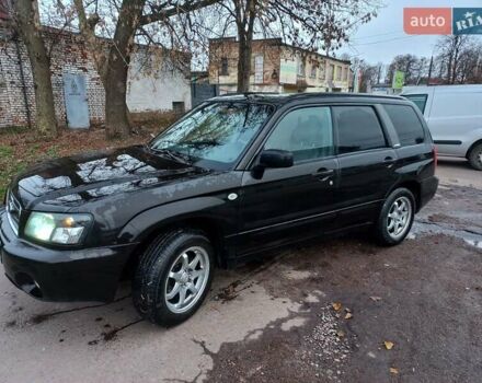 Черный Субару Форестер, объемом двигателя 1.99 л и пробегом 295 тыс. км за 5500 $, фото 1 на Automoto.ua