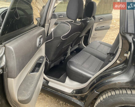 Черный Субару Форестер, объемом двигателя 1.99 л и пробегом 300 тыс. км за 3200 $, фото 9 на Automoto.ua