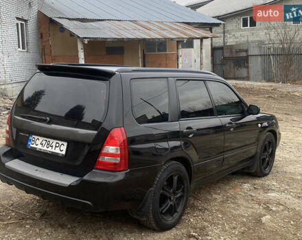 Черный Субару Форестер, объемом двигателя 1.99 л и пробегом 300 тыс. км за 3200 $, фото 3 на Automoto.ua