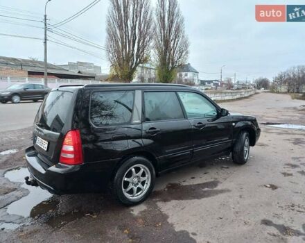 Черный Субару Форестер, объемом двигателя 1.99 л и пробегом 295 тыс. км за 5500 $, фото 3 на Automoto.ua