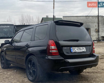 Черный Субару Форестер, объемом двигателя 1.99 л и пробегом 300 тыс. км за 3200 $, фото 4 на Automoto.ua